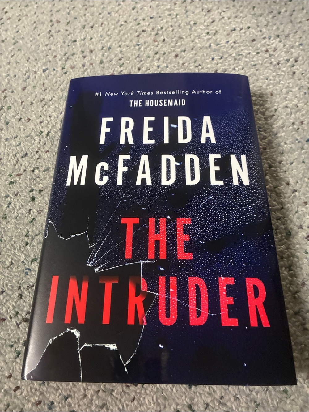 Freida McFadden "The Intruder" Hardcover Book - Navy & Red